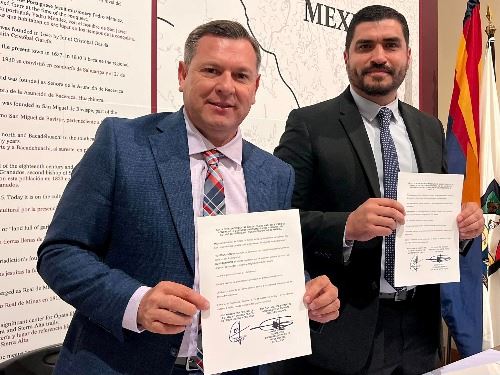 Madgalena De Kino Mayor and San Luis Council Member Vargas holding signed agreements
