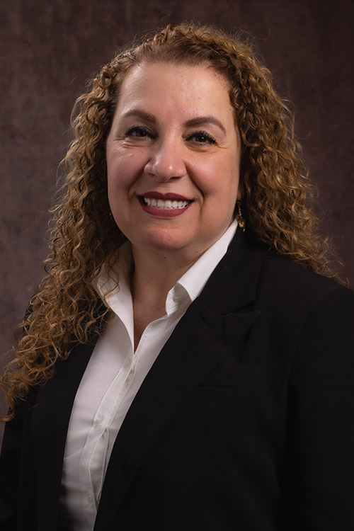 roula encinas acting director of finance